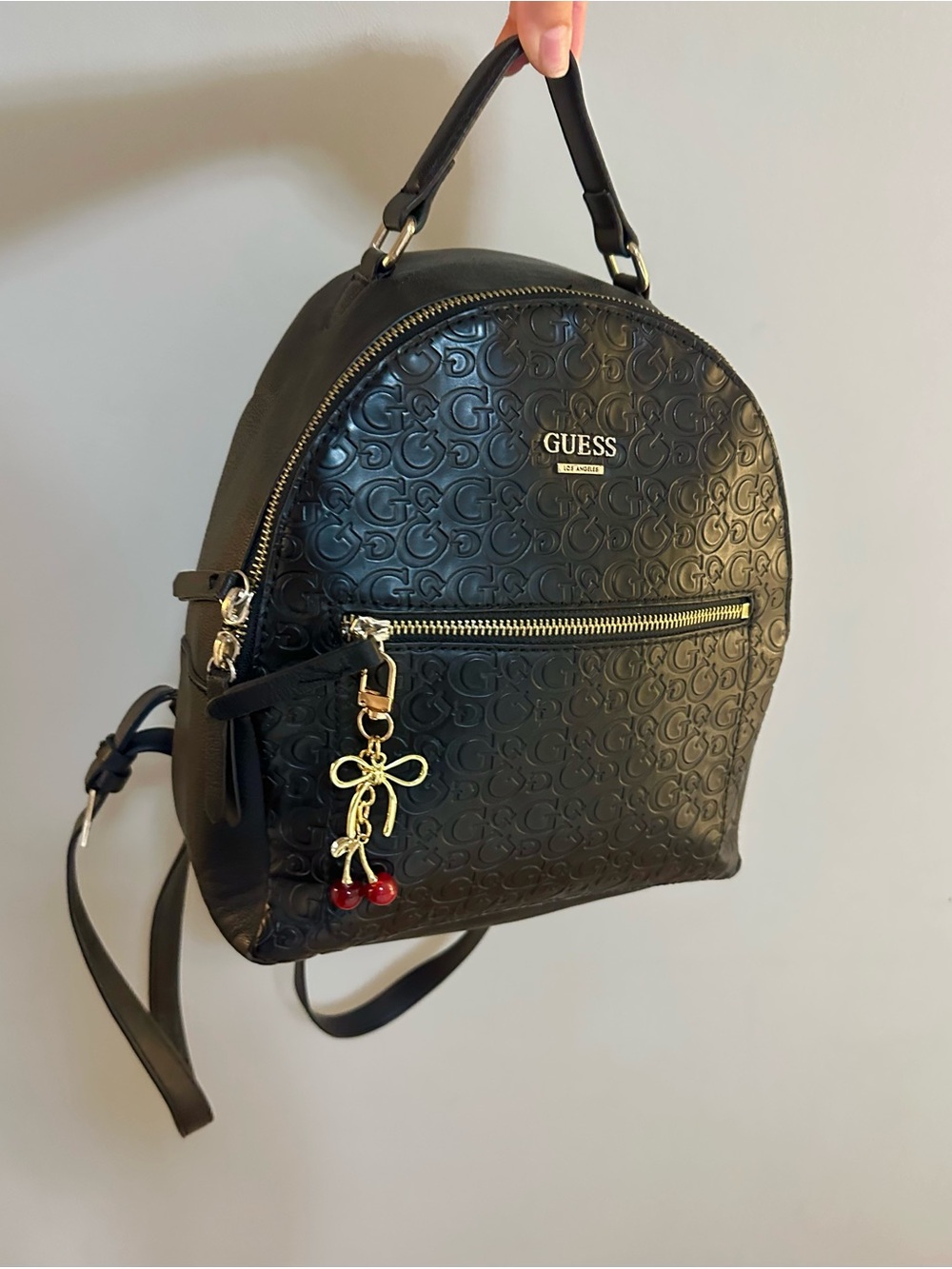 GUESS Black Embossed Logo Mini Backpack with Cherry Charm